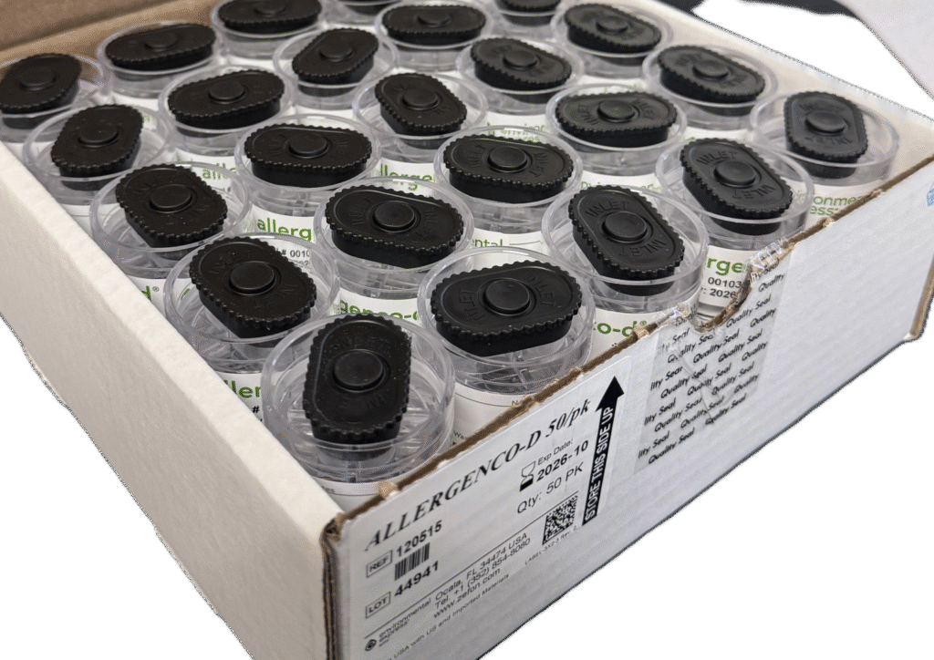 Spore trap cassette for air sampling, Air-O-Cell and Allergenco-D, shown on a laboratory surface.